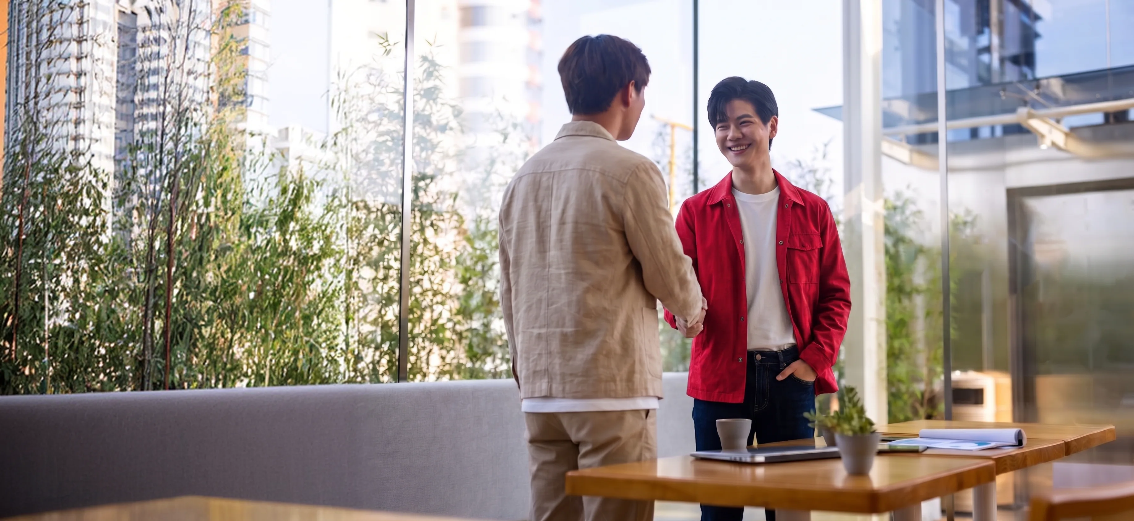 Two people shaking hands, representing trusted identity and warranty protection